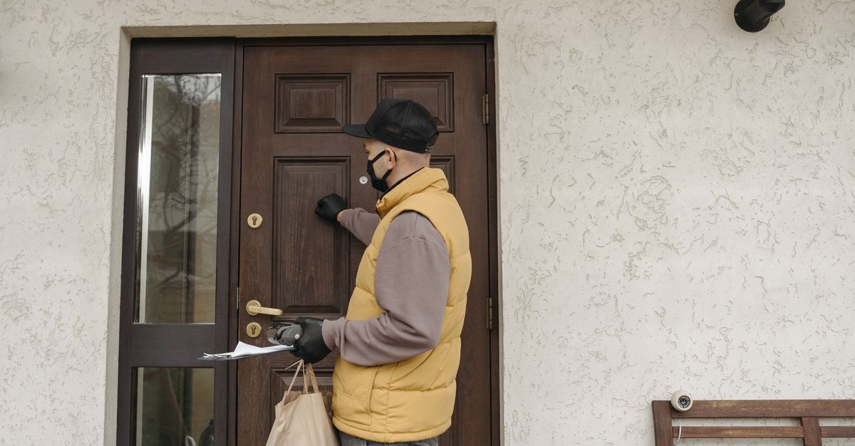 locksmith unlocking front door — Westbury Locksmiths
